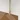 Golden shower wall support with a sleek design, perfect for modern bathrooms, secures a glass shower wall stably and stylishly.