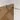 Brown glass shower wall with matte metal fittings, modern design suitable for stylish bathroom interiors.