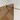 Brown glass shower screen with gold-coloured fixing system, modern design - ideal for a stylish bathroom.