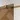 Mat copper-coloured shower wall, minimalist design, with glass panel and sleek finish, ideal for a modern bathroom.