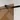 Mat glass shower wall in bronze colour, sleek design with minimalist profile, ideal for a modern bathroom style.