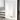 Vertical white designer radiator, slim slats, suitable for modern bathrooms, sleek minimalist design.