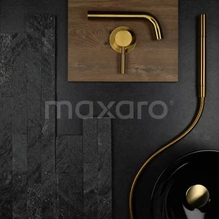 Matt gold concealed basin tap with curved spout, minimalist design on a dark marble bathroom background.