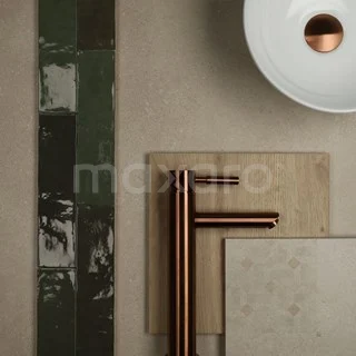 Luxury bathroom tap in rose gold, minimalist design, combined with green and beige tiles and a white countertop wash basin.