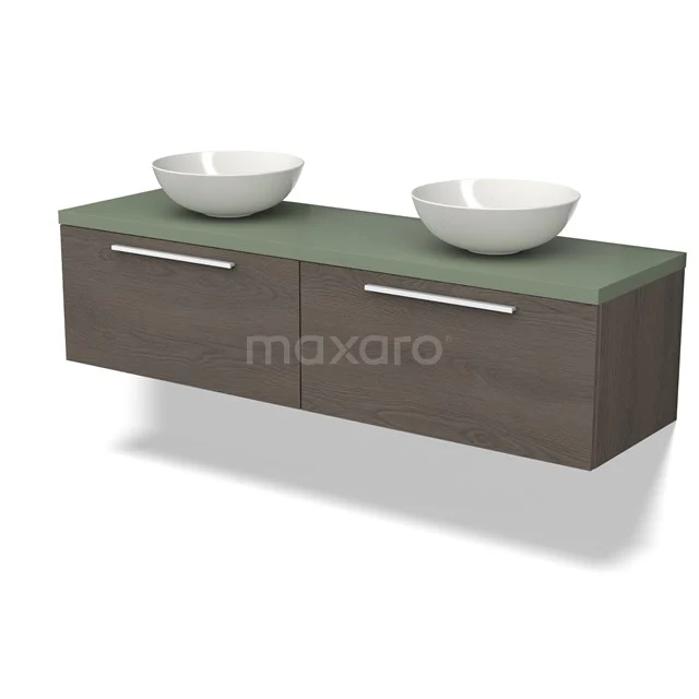 Doppelwaschbeckenunterschrank Holzoptik mit grüner Oberfläche, zwei weißen runden Aufsatzwaschbecken und metallischen Haltegriffen; modernes Badmöbel.