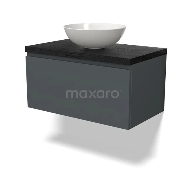 Grijs hangend badkamermeubel met zwarte houtlook bovenblad en witte opzetwaskom, modern design.