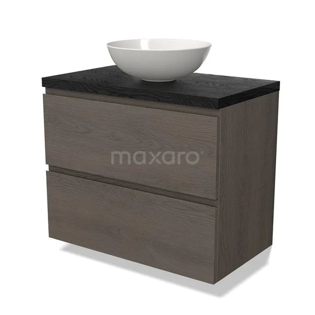 Wooden bathroom unit with dark worktop, white bowl-shaped basin, and two drawers; sleek design for modern bathrooms.