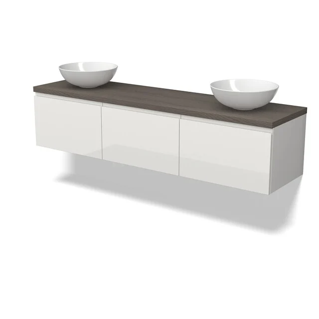 Weißes schwebendes Badezimmermöbel mit dunklem Holzplatte, zwei runden Aufsatzwaschbecken und drei grifflose Schubladen.