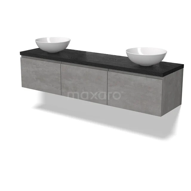 Grijze zwevende badkamermeubel met zwart blad, twee witte komvormige wastafels, modern design in betonlook.
