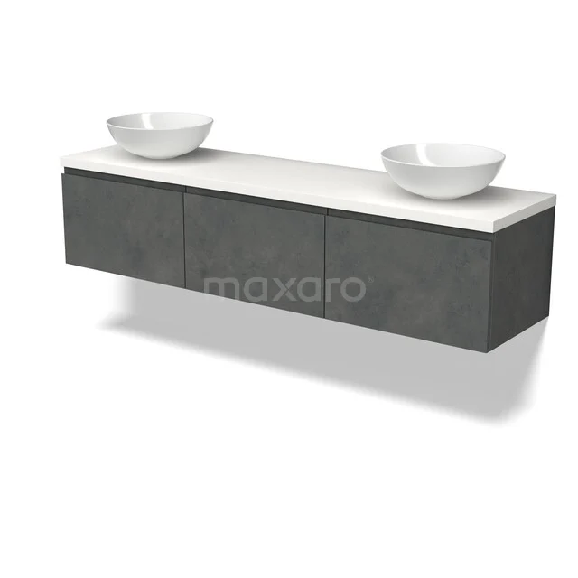 Donkergrijze betonnen badkamermeubel met dubbele witte opzetwastafels en mat afwerking, modern en strak design.
