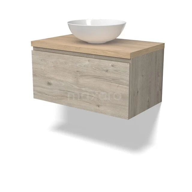 Houten badkamermeubel in licht eiken met wandmontage, voorzien van een witte ronde waskom bovenop.