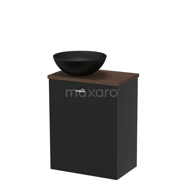Black washbasin unit with a matte black round basin, wooden top and storage cabinet, ideal for a stylishly furnished bathroom.