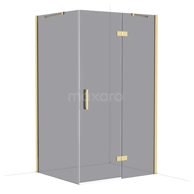 Glass shower cabin with corner entry and brass details, suitable for modern bathrooms.