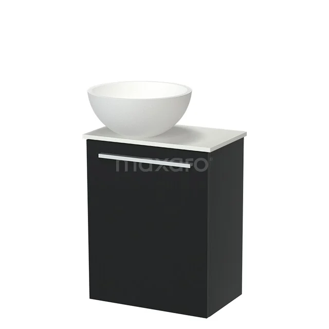 Black bathroom furniture with a matte white bowl-shaped sink, sleek design cabinet with chrome handle.