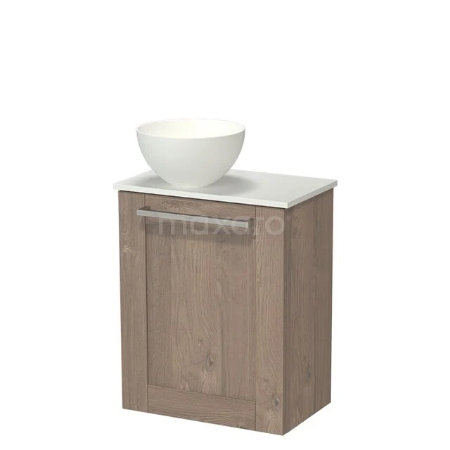 Wooden bathroom cabinet with door, white washbasin and marble top, compact design for modern bathroom interiors.