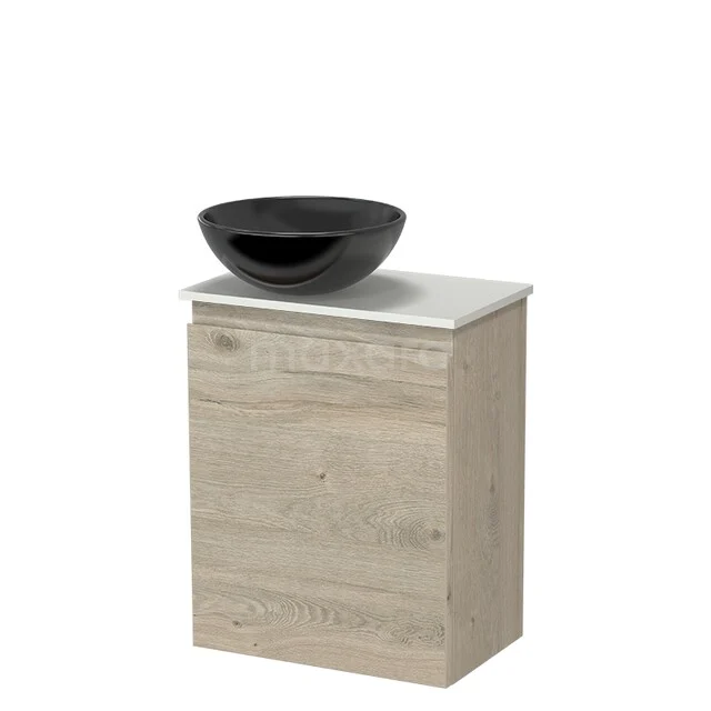 Wooden bathroom furniture in oak look with black washbasin and white top, compact and stylish design for modern bathrooms.