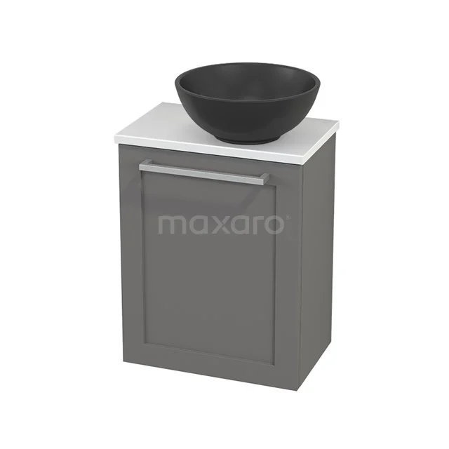 Grey bathroom cabinet with black countertop wash basin, white top and modern handle, compact design for stylish bathroom storage.