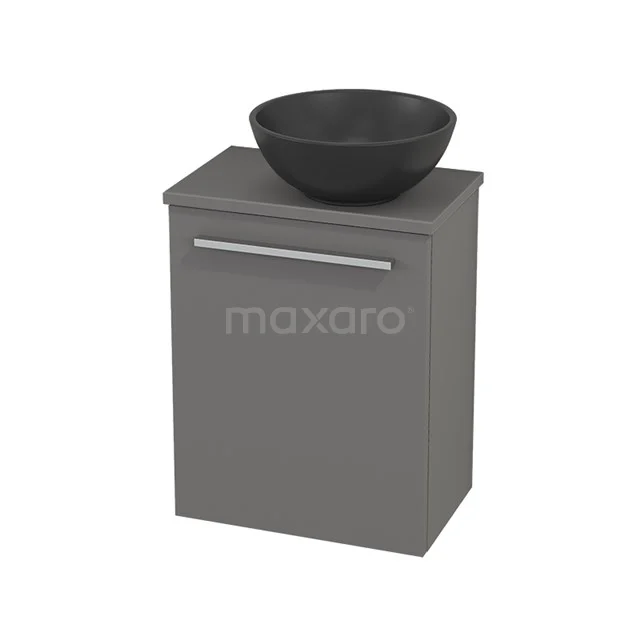 Grey bathroom furniture set with black countertop wash basin, modern design, ideal for compact bathrooms.