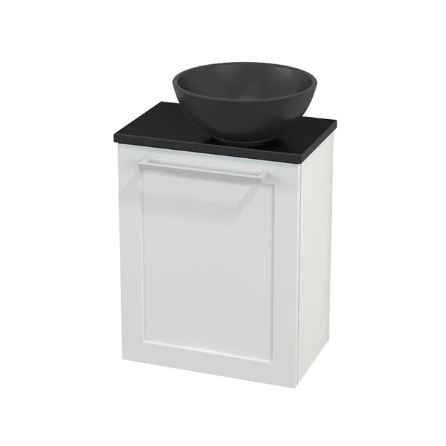 White bathroom unit with black marble countertop wash basin, compact shape, ideal for modern bathrooms.