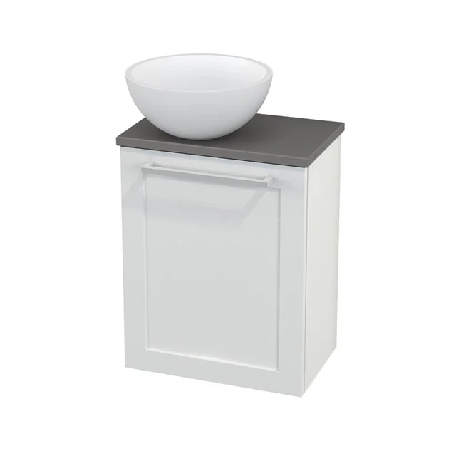 White bathroom unit with grey top and round, white countertop wash basin; ideal for a modern bathroom design.