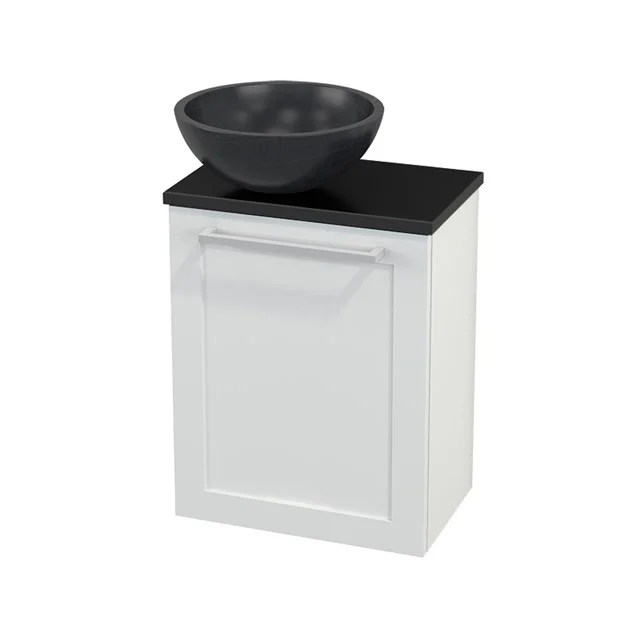 White bathroom unit with black vanity units for countertop wash basin, modern design and compact size, perfect for stylish bathroom design.