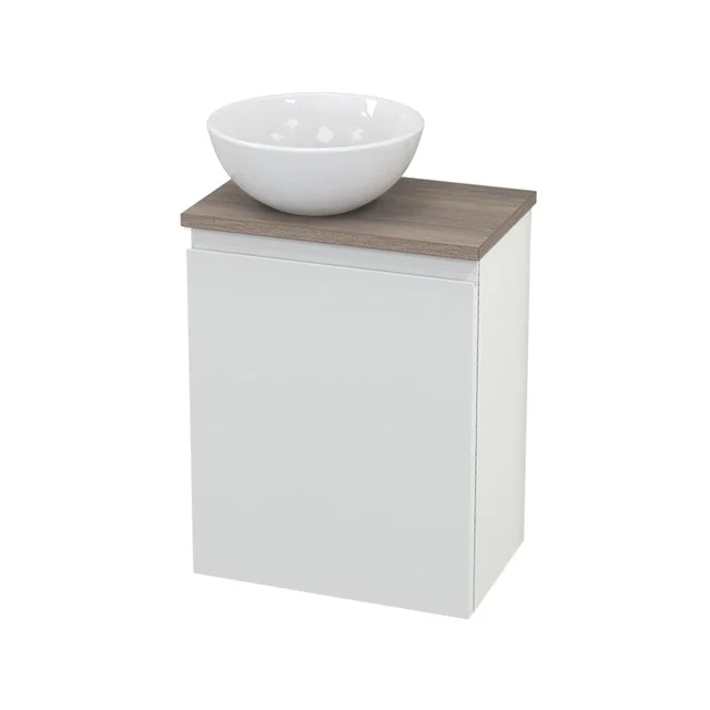 White bathroom unit with oak worktop and round, white vanity units with basin; sleek design ideal for modern bathrooms.