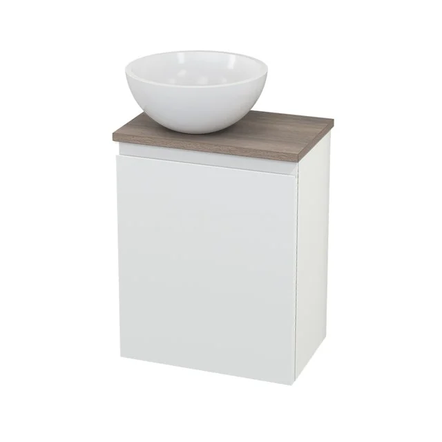 White bathroom unit with ceramic countertop wash basin and wood-look worktop, modern design, ideal for compact bathrooms.