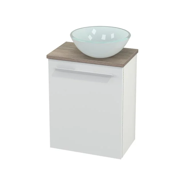 White bathroom unit with wooden worktop and crystal-clear countertop wash basin, modern look and ideal for compact bathrooms.