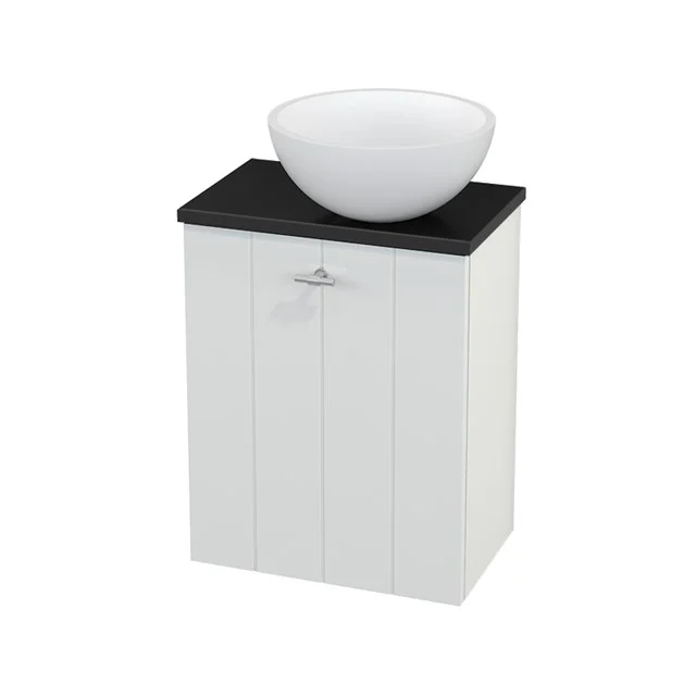 White bathroom unit with black top, round countertop basin and horizontal grooves, ideal for modern bathrooms.