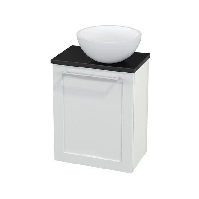 White bathroom furniture set with black worktop and round ceramic countertop wash basin, compact and stylishly designed for modern bathrooms.