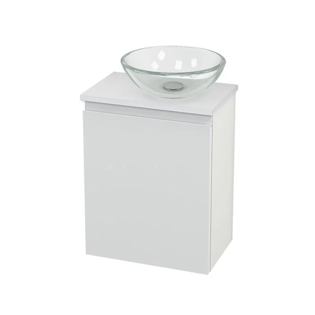 White wooden bathroom cabinet with countertop wash basin made of glass, compact design ideal for modern bathroom fittings.