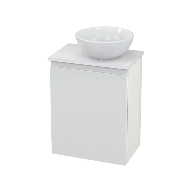 White bathroom unit with ceramic countertop wash basin, compact design and clean lines, ideal for small bathrooms.