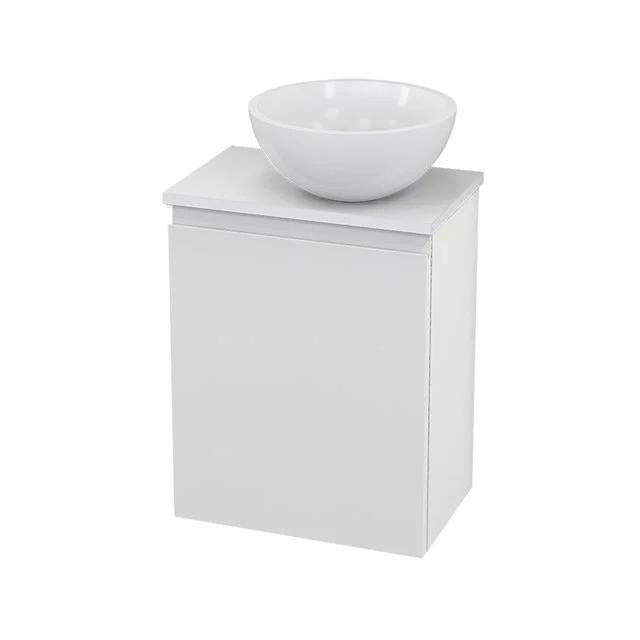 White bathroom unit with ceramic countertop wash basin, clean design and compact shape, ideal for modern bathroom design.
