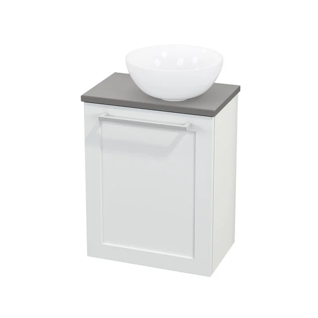 White bathroom unit with grey worktop and round ceramic countertop wash basin, compact design for a modern bathroom.