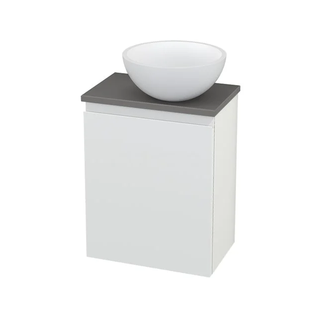 White bathroom unit with round countertop wash basin, grey worktop and sleek design, ideal for a modern bathroom design.