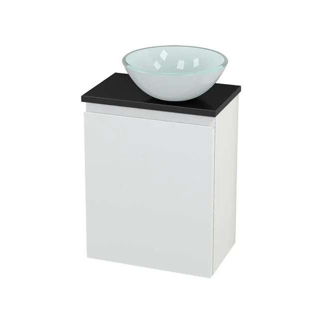 White bathroom unit with black top, glass top washbasin; sleek design for modern bathroom design.