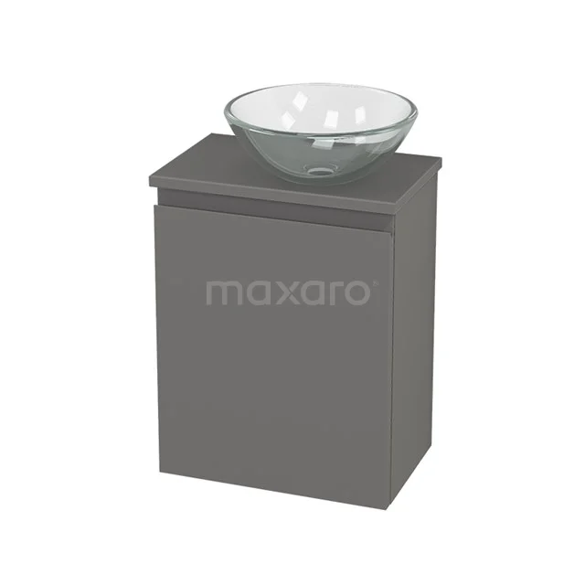 Grey bathroom cabinet with glass round countertop wash basin, sleek design, ideal as a stylish storage solution in modern bathrooms.