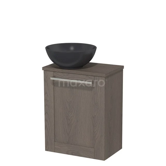 Wooden bathroom cabinet with dark basin, compact design, ideal for small bathrooms, metal handle included.