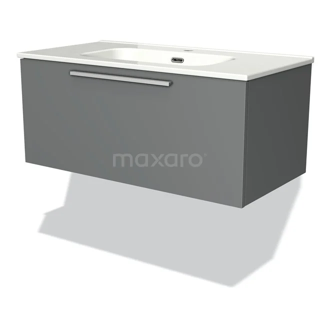 Grijze zwevende badkamerkast met geïntegreerde witte wastafel, modern design en metalen handgreep.