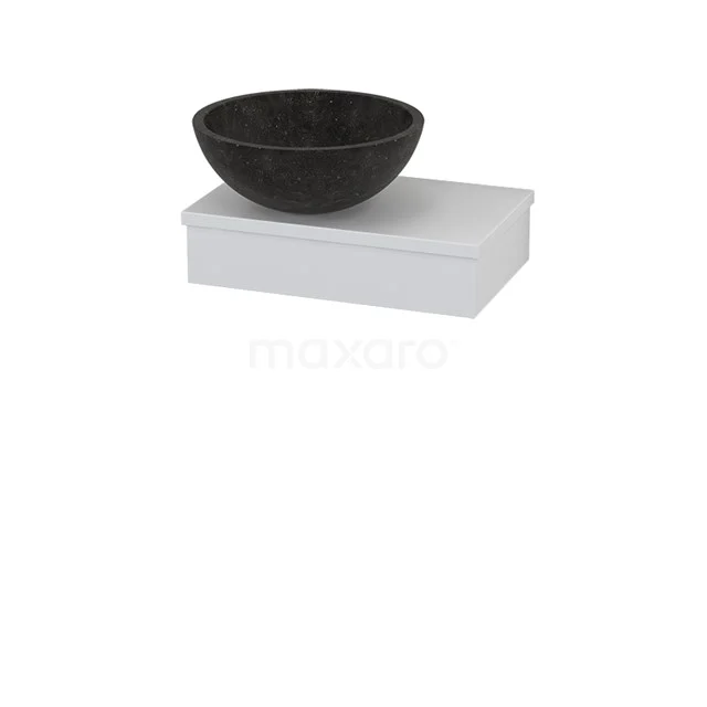 Black round countertop wash basin made of natural stone on a white rectangular bathroom unit; stylish design for modern bathrooms.