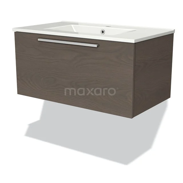 Donkerhouten zwevend badkamermeubel met witte keramische wasbak en metalen handgreep, modern design.