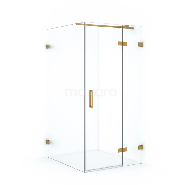 Glass shower enclosure with gold hinges and handle, sleek design for a luxurious look in the bathroom.