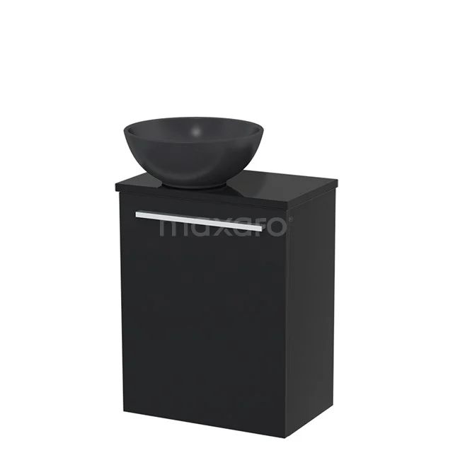Black bathroom furniture set with matte black cabinet and round countertop wash basin made of ceramic, ideal for a modern bathroom style.