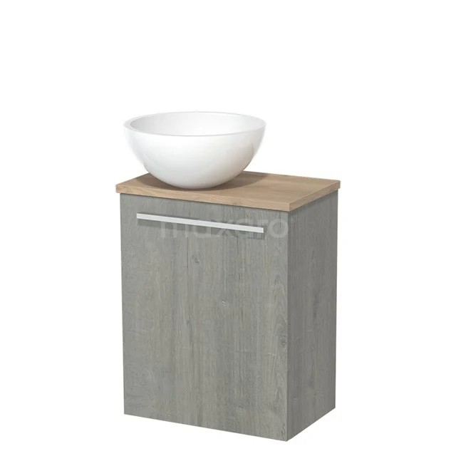 Grey bathroom cabinet with wood look, practical storage space and surface-mounted basin; modern design for any bathroom.