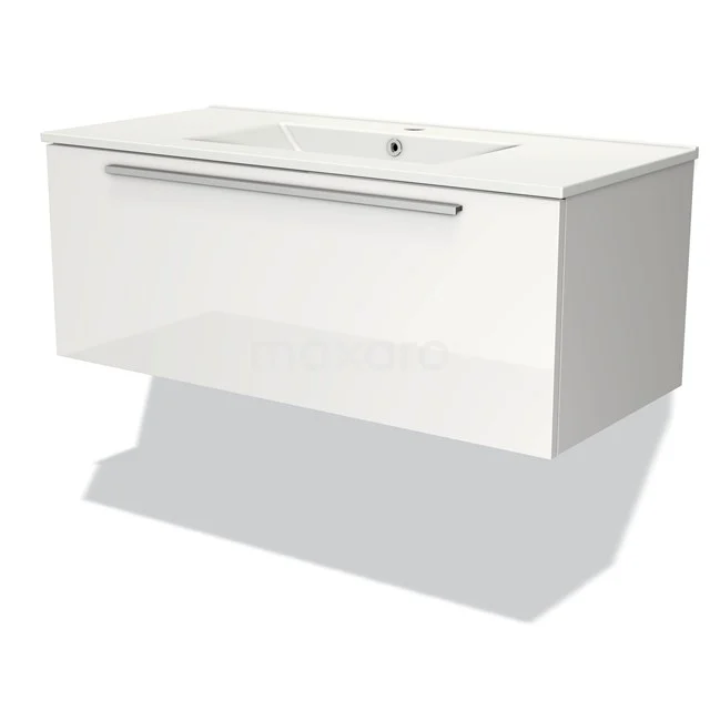 White suspended bathroom unit with glossy finish, wide drawers and integrated vanity units with basin made of ceramic.