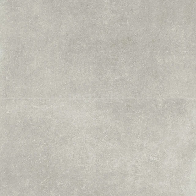 Hellgraue Keramikfliese für Badezimmer, mit Betonlook-Oberfläche und matter Textur, ideal für moderne Badezimmerstile.