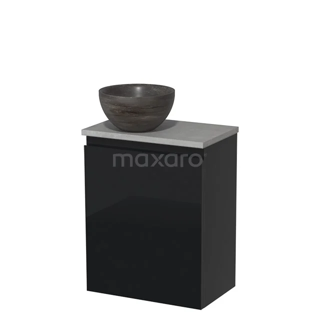 Black bathroom cabinet with matte finish, grey stone worktop and ceramic countertop wash basin; modern design for compact bathrooms.
