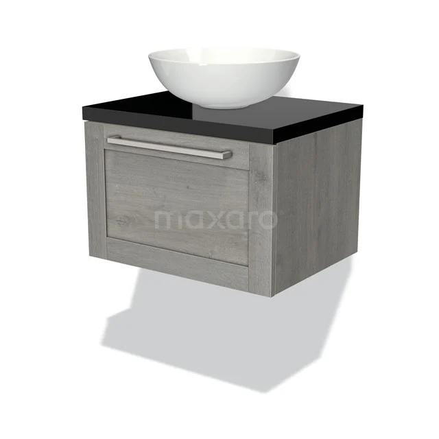 Grey floating bathroom furniture set with wooden drawers, black worktop and white bowl-shaped sink.