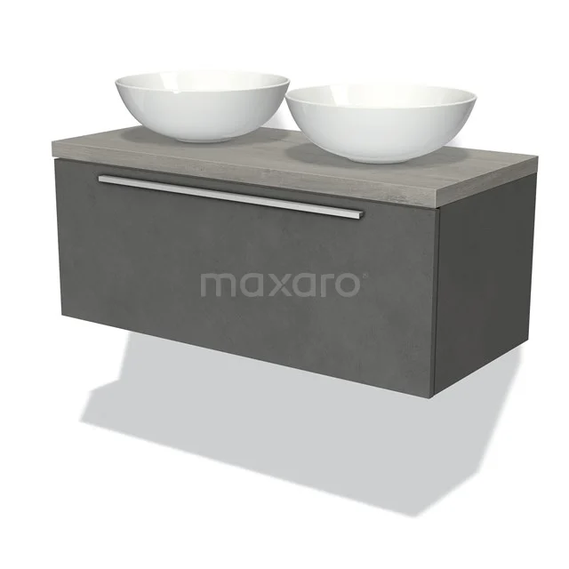 Graues Badezimmermöbel mit Betonlook, zwei weiße runde Aufsatzwaschbecken, chromfarbener Haltegriff, modernes Design für stilvolle Bäder.