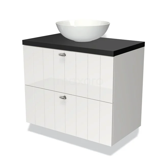 White bathroom unit with black wooden worktop and round ceramic countertop wash basin, modern design with vertical grooves.